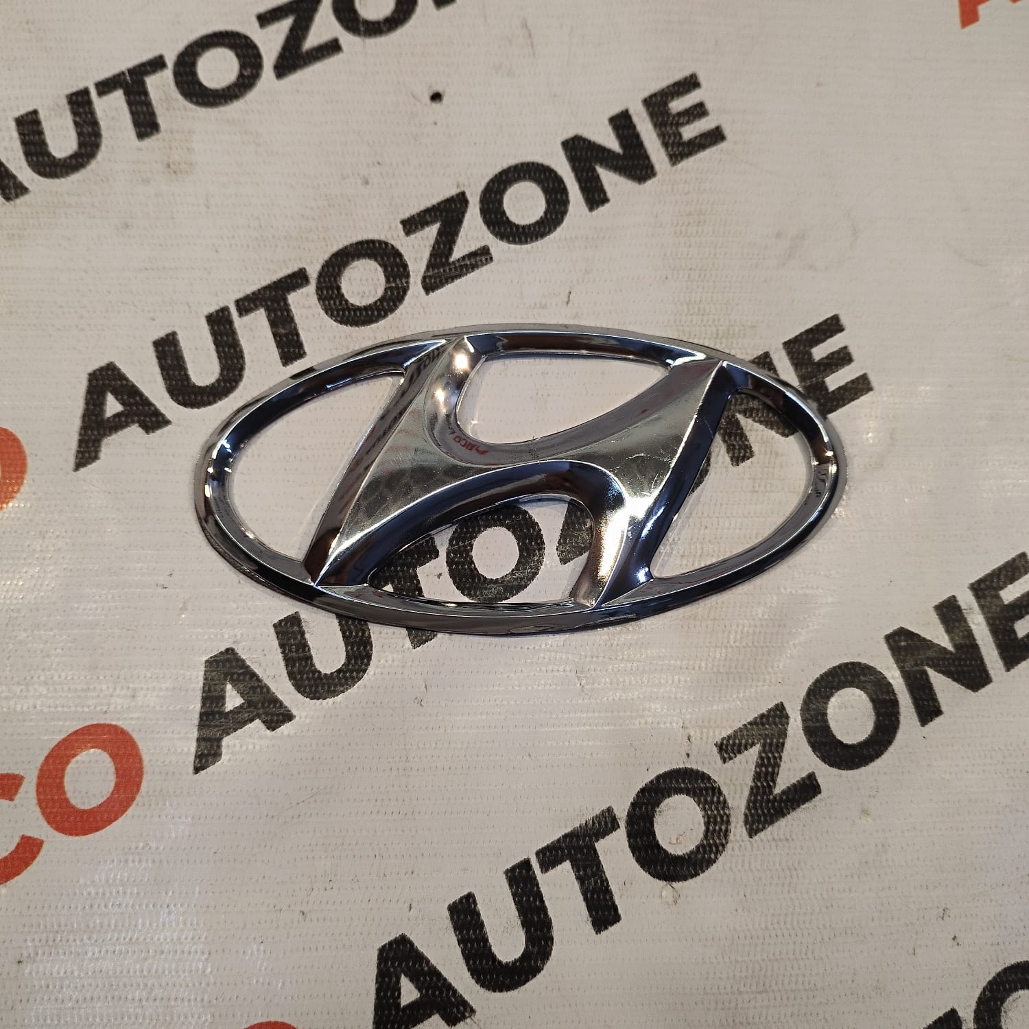 FRONT GRILL LOGO I20 12