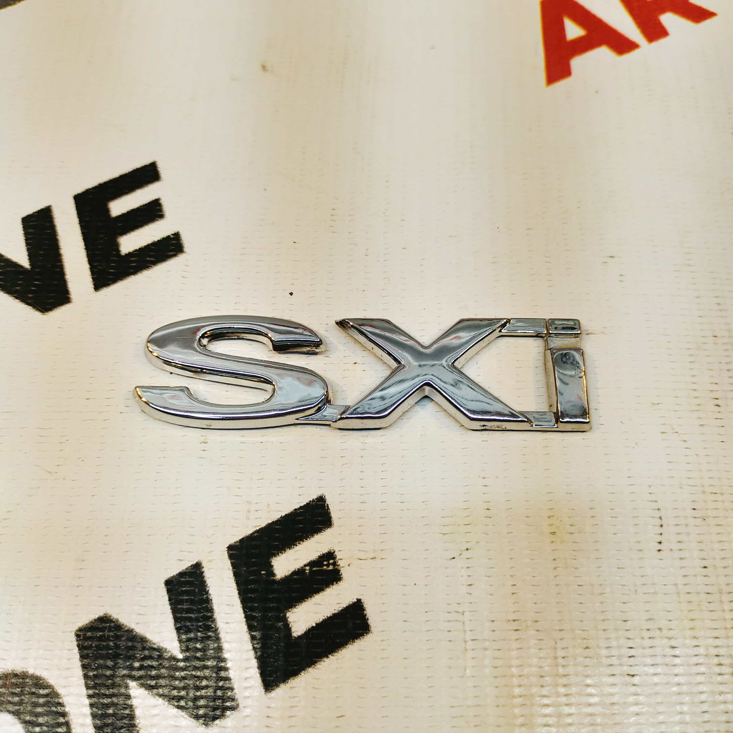 SINGLE LOGO SXI