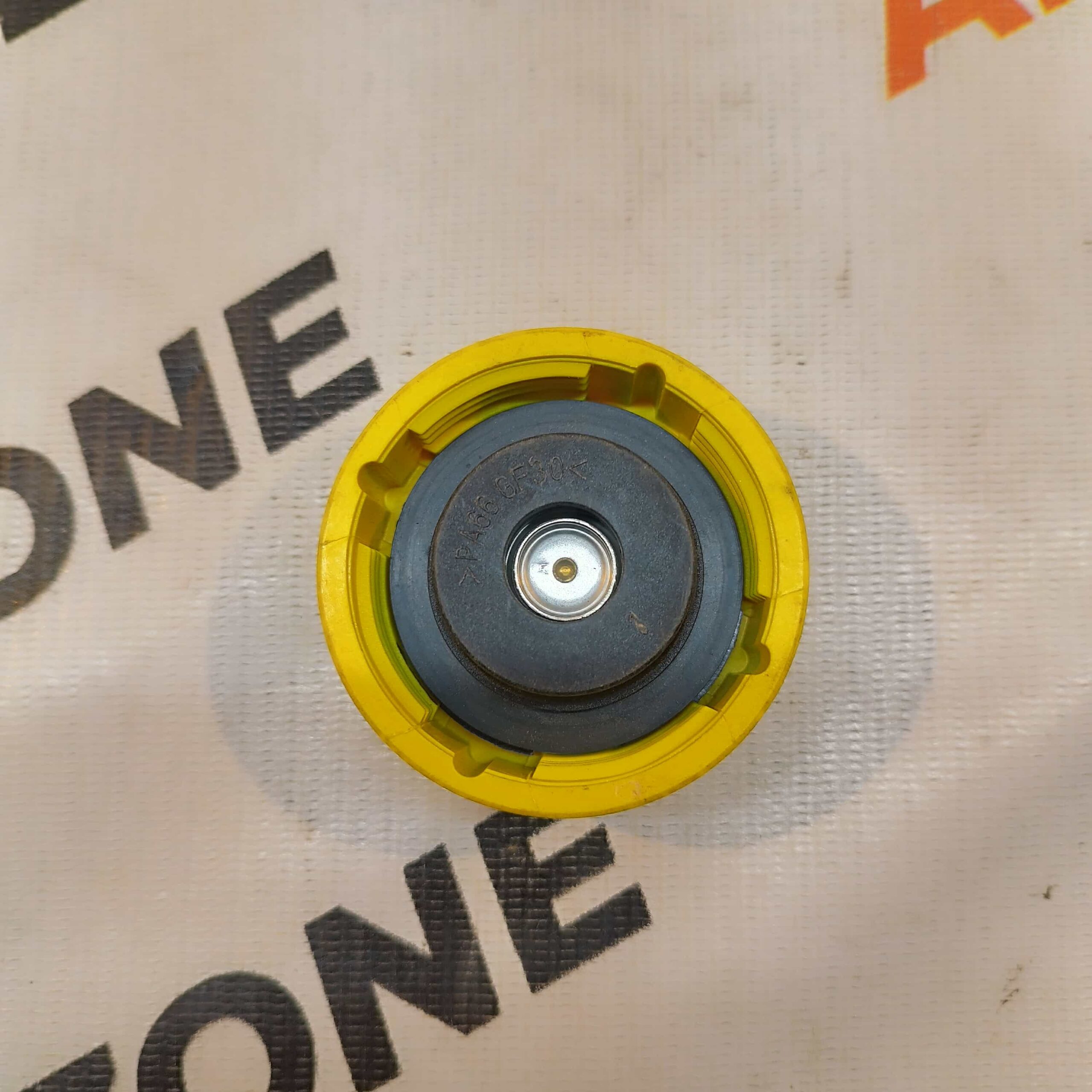 COOLANT CAP XUV300 YELLOW