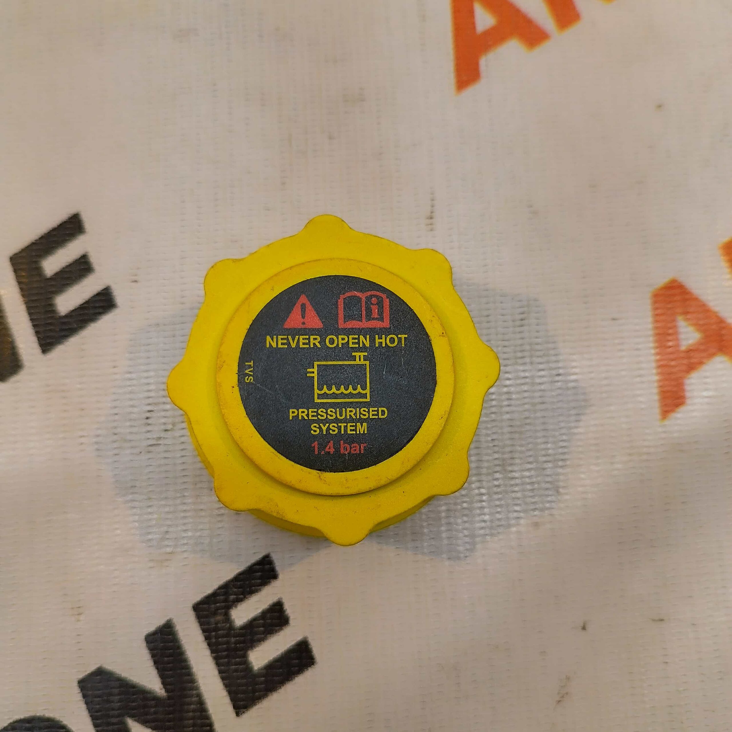 COOLANT CAP XUV300 YELLOW