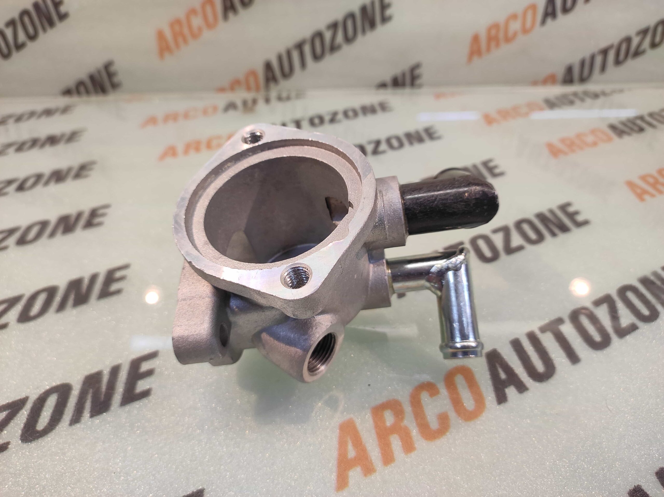 THERMO ELBOW HOUSING VERNA I20 1.5 IMP 25610