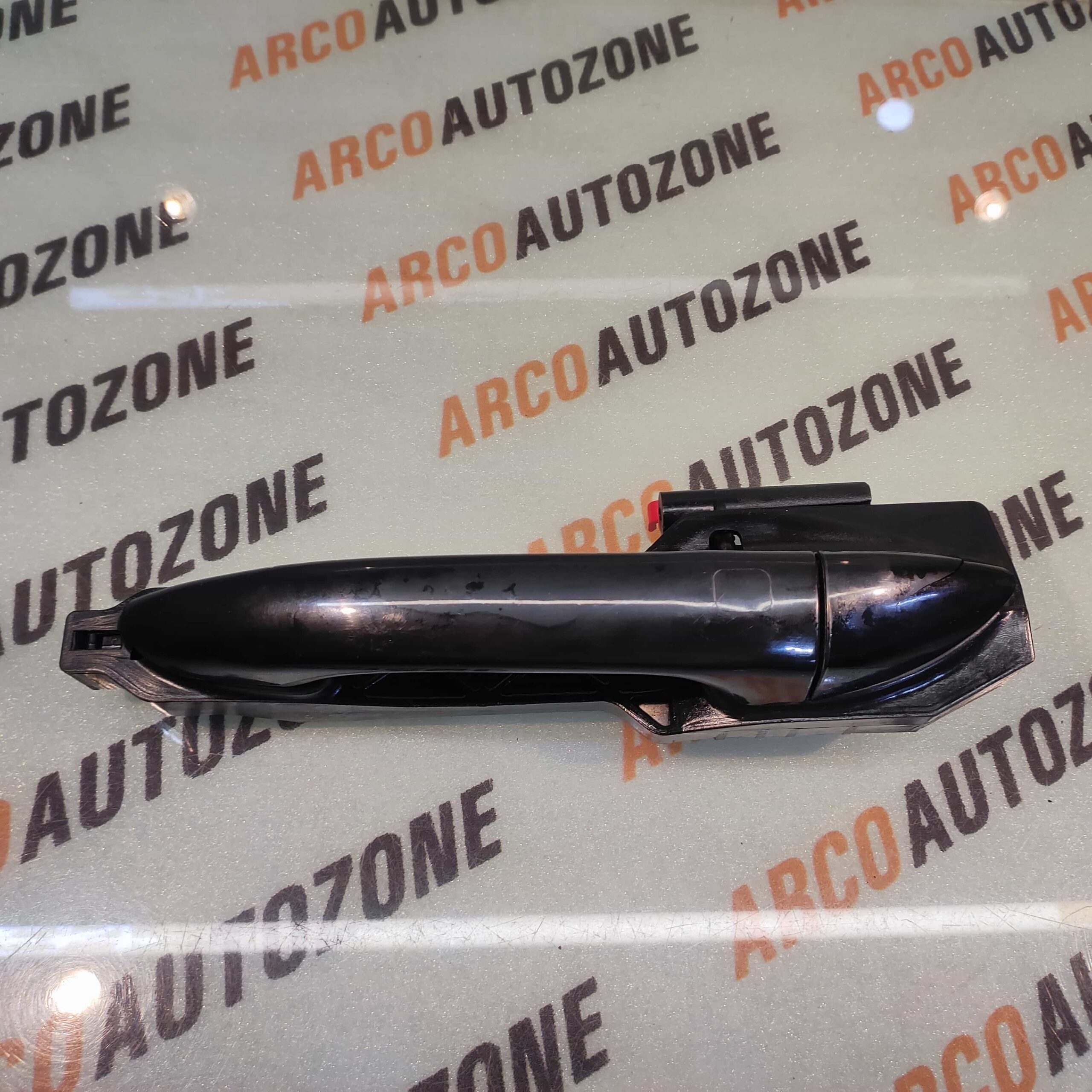 OUTER HANDLE WITH BRACKET GRAND XCENT REAR LEFT IND CI00266L