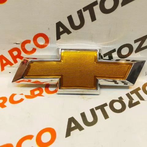 FRONT GRILL LOGO TAVERA T3 IMP