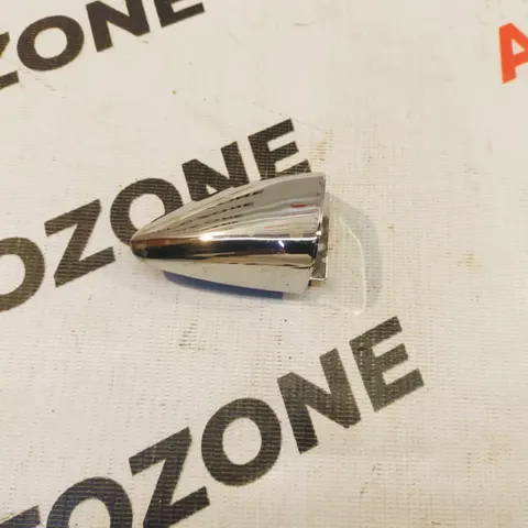 OUTER HANDLE CAP CHR GRAND XCENT FRONT LEFT HOLE IMP